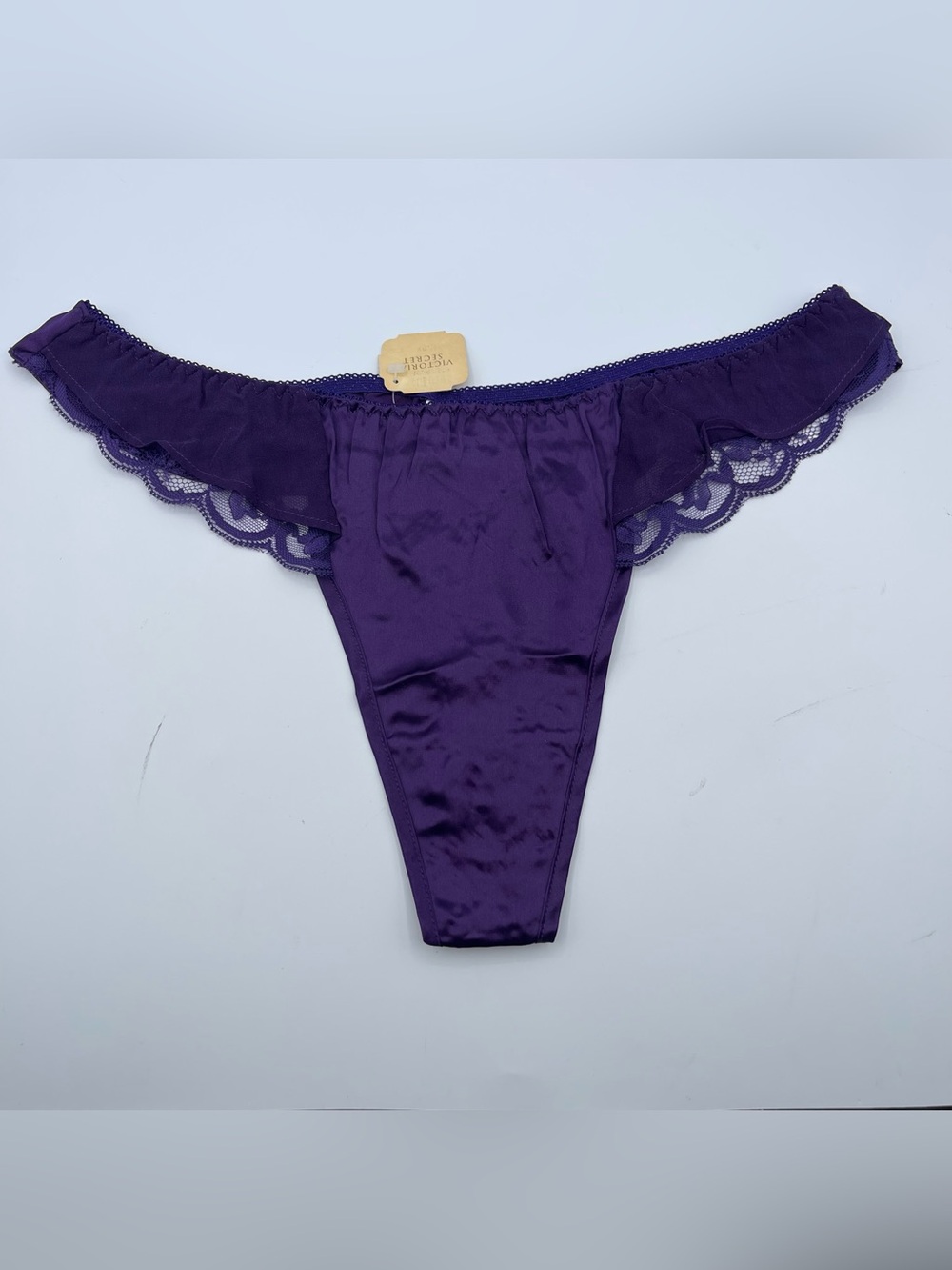 Vintage Gold label Victoria’s Secret Silk dark purple Thong NEW with tags